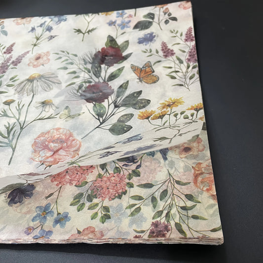 Floral patterned fabric on a dark background