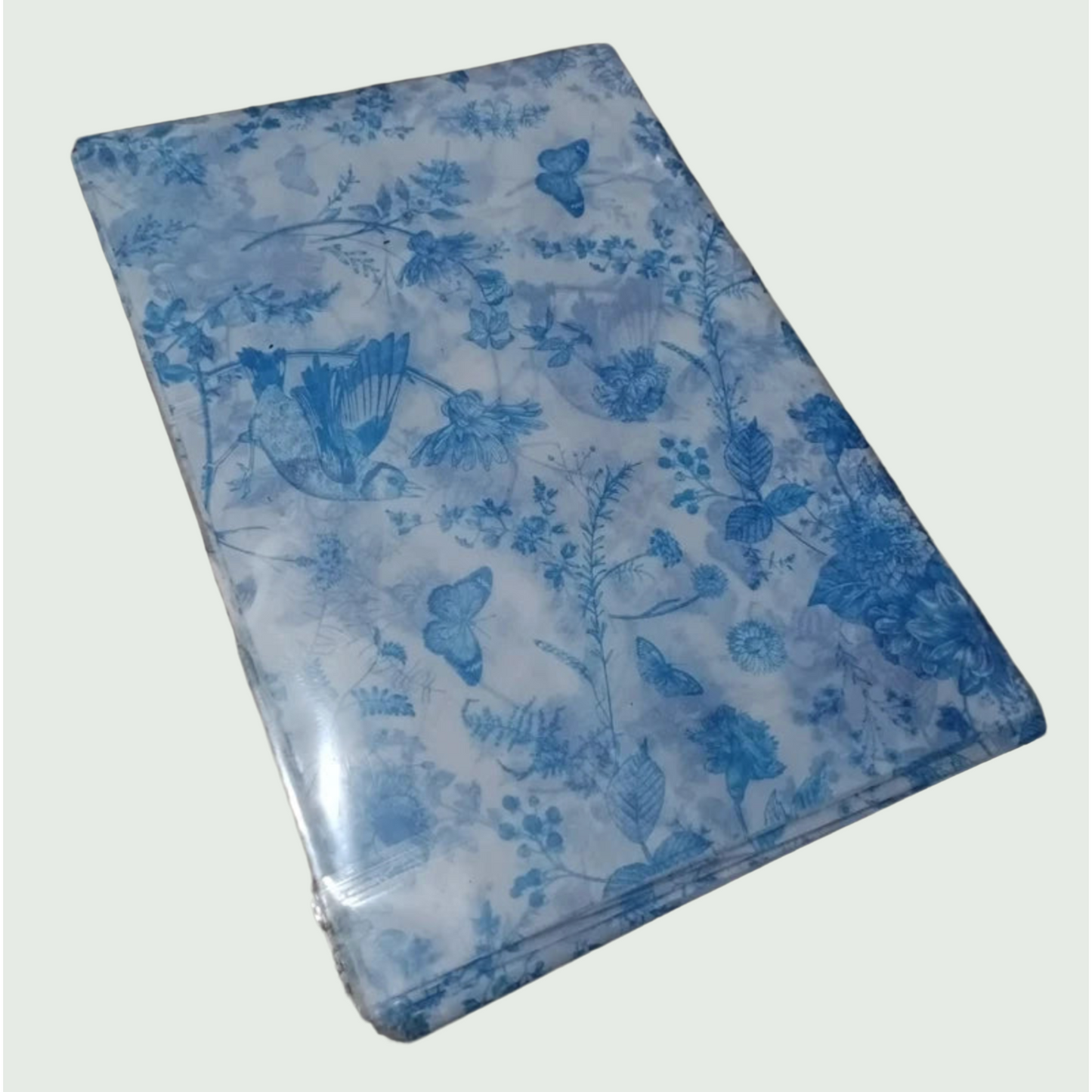 Blue butterfly patterned paper on a white background