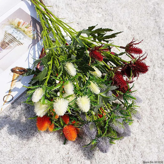 Bouquet of colorful flowers on a textured surface with a pair of scissors.