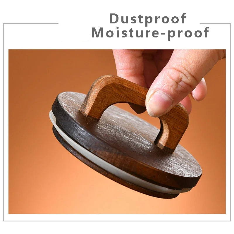 Wooden product with a hand holding it against an orange background, labeled 'Dustproof Moisture-proof'.