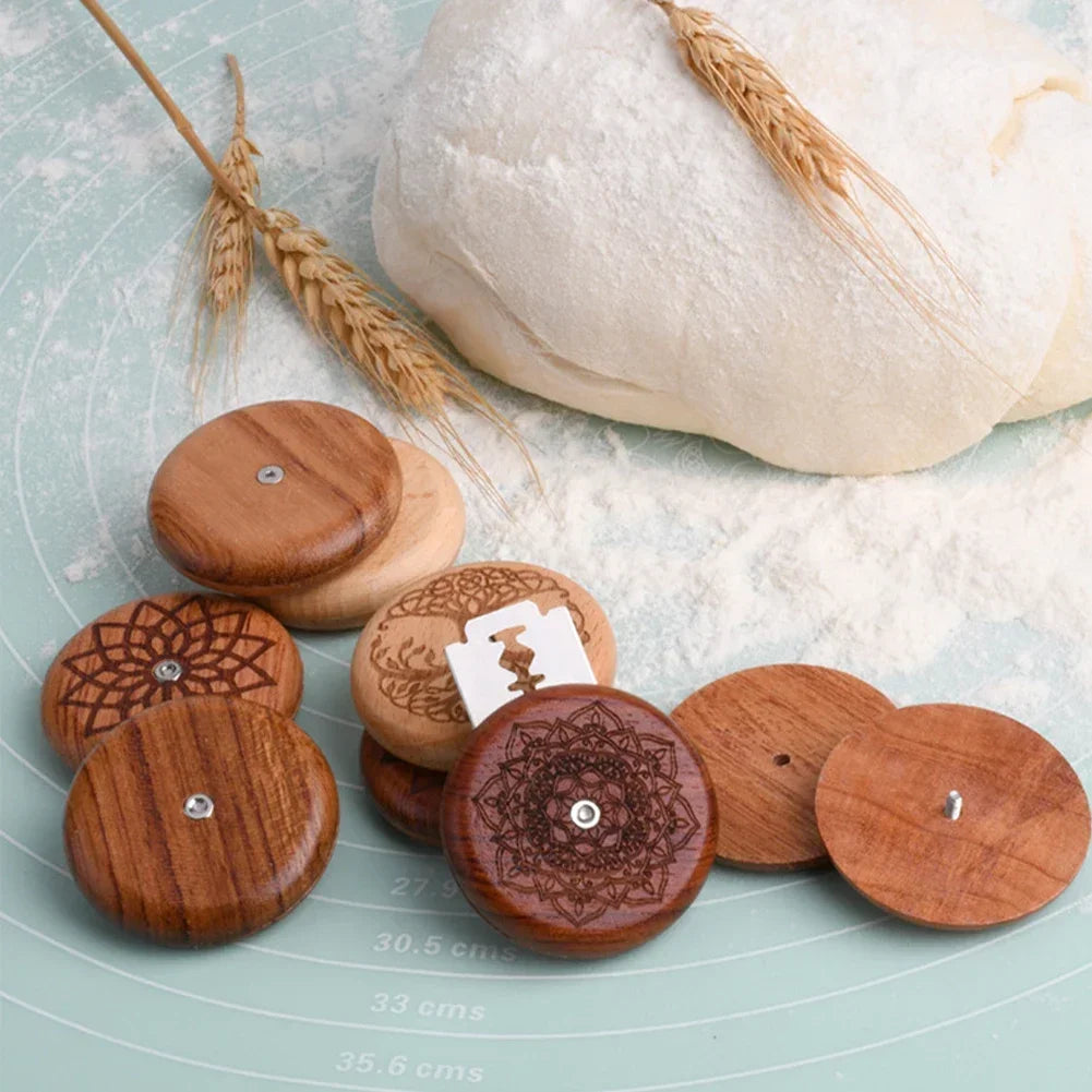 Wooden buttons with intricate designs on a light blue surface with stones and wheat.