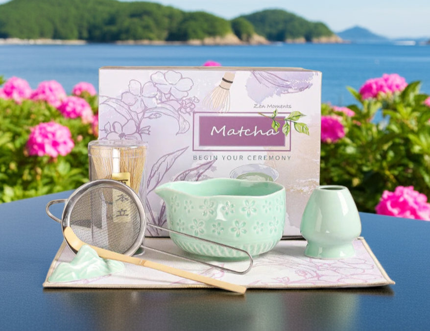 Tea-making set with a scenic background of water and mountains