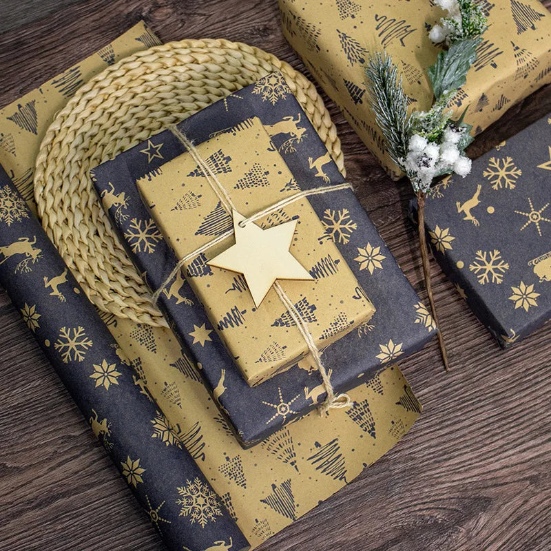Gift boxes wrapped in blue and gold patterned paper on a wooden surface.