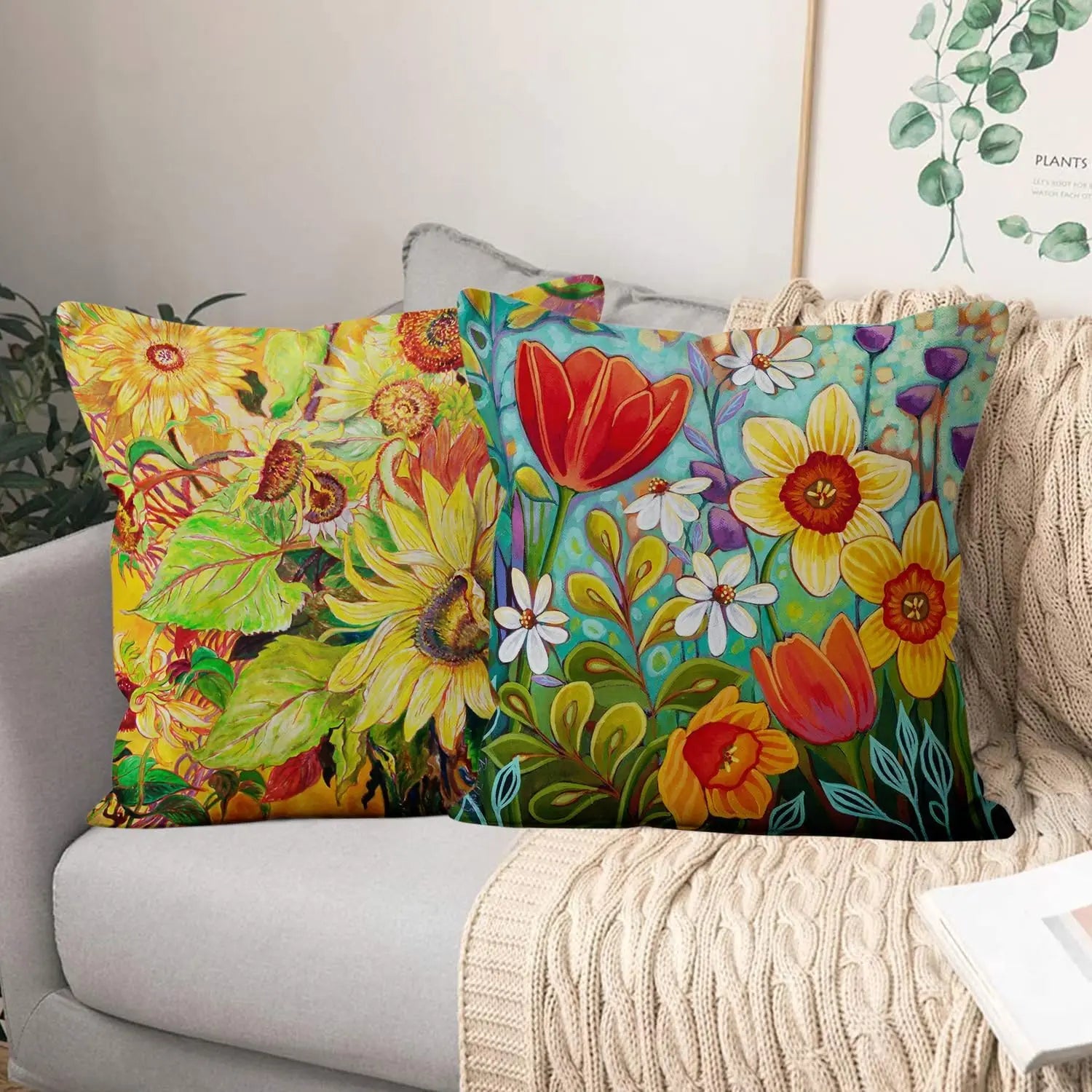 Colorful floral pillows on a couch with a neutral background