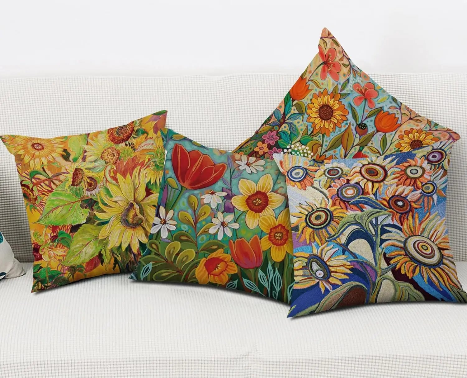 Colorful floral-patterned pillows on a white sofa