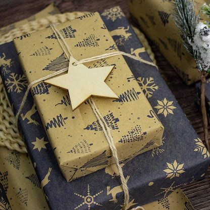Gift boxes wrapped in festive paper with star decorations on a textured surface.