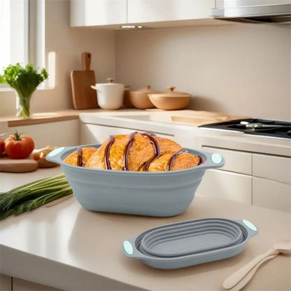 Collapsible silicone baking dish with bread in a kitchen setting