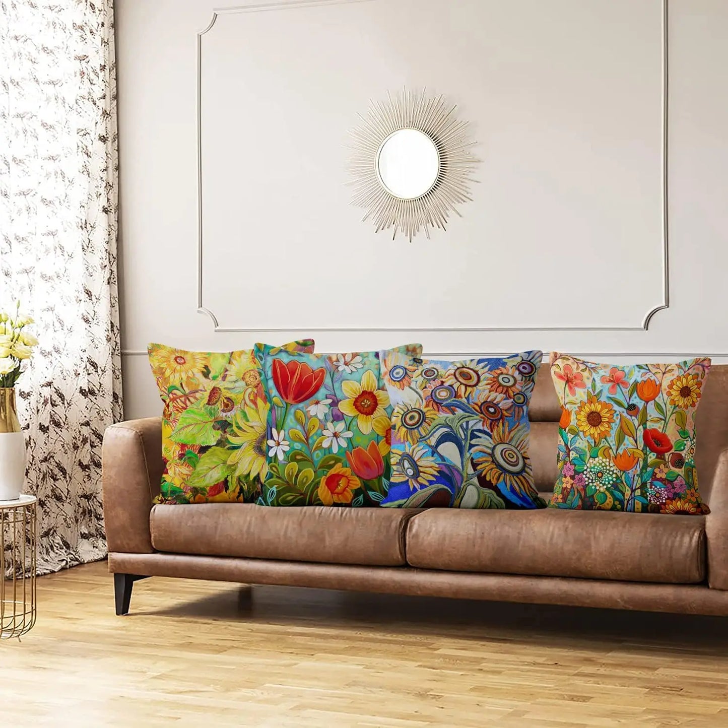 Brown leather sofa with colorful floral cushions in a living room setting.