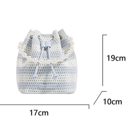 White crochet bag with measurements on a white background