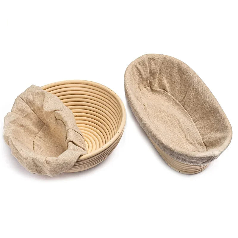 Two bread proofing baskets with cloth covers on a white background, branded 'Afrenee'.