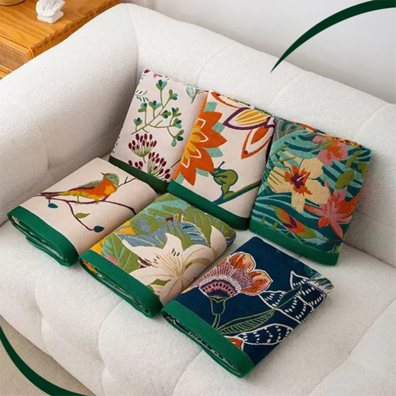 Colorful floral-patterned cushions on a white sofa