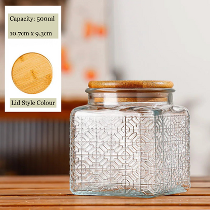 Glass jar with a wooden lid on a wooden surface, with product details on the left.
