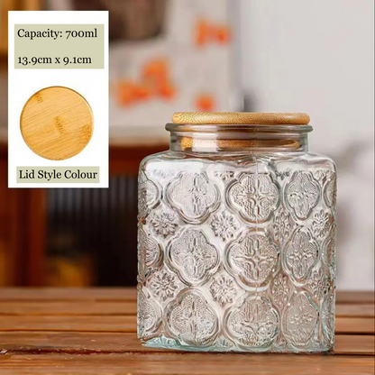 Decorative glass jar with wooden lid on a wooden surface, with capacity and dimensions displayed.