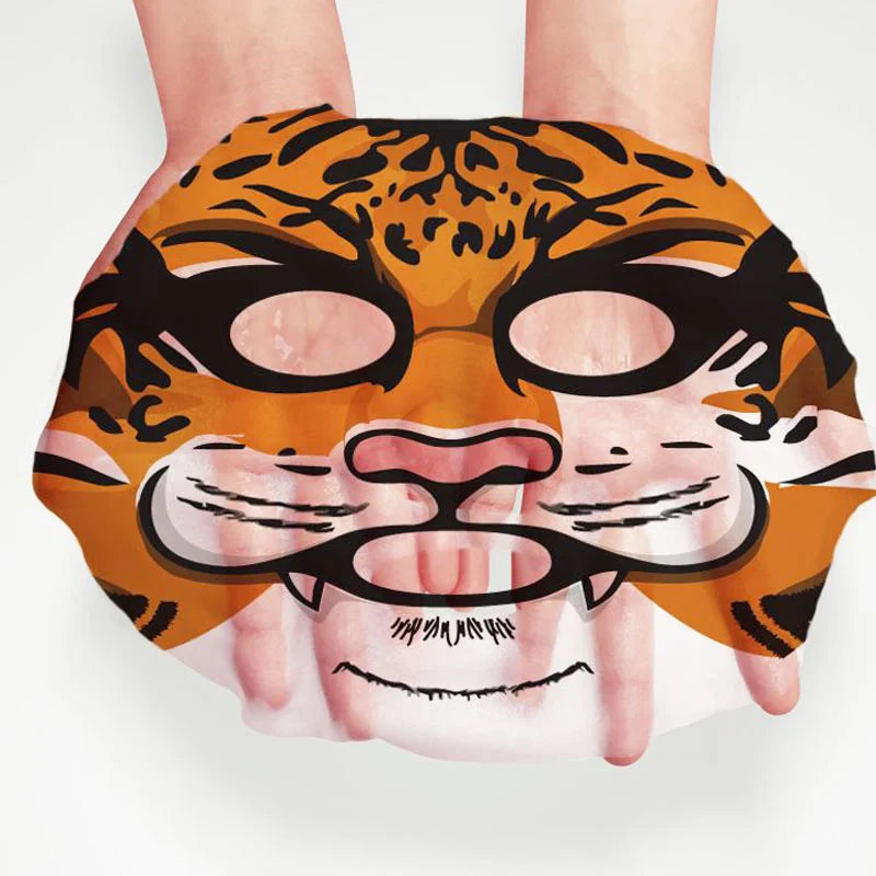 Person wearing a tiger face mask on a white background