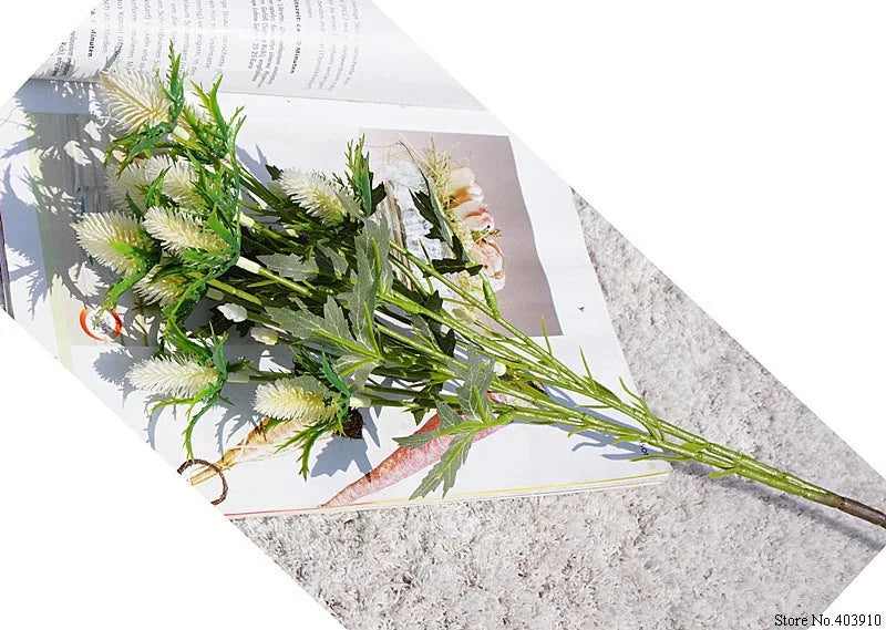 Bouquet of flowers on a textured surface with a magazine underneath