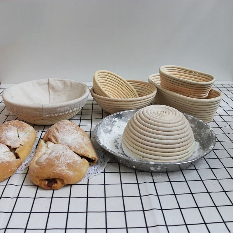 Baked bread and bread-making baskets on a checkered tablecloth
