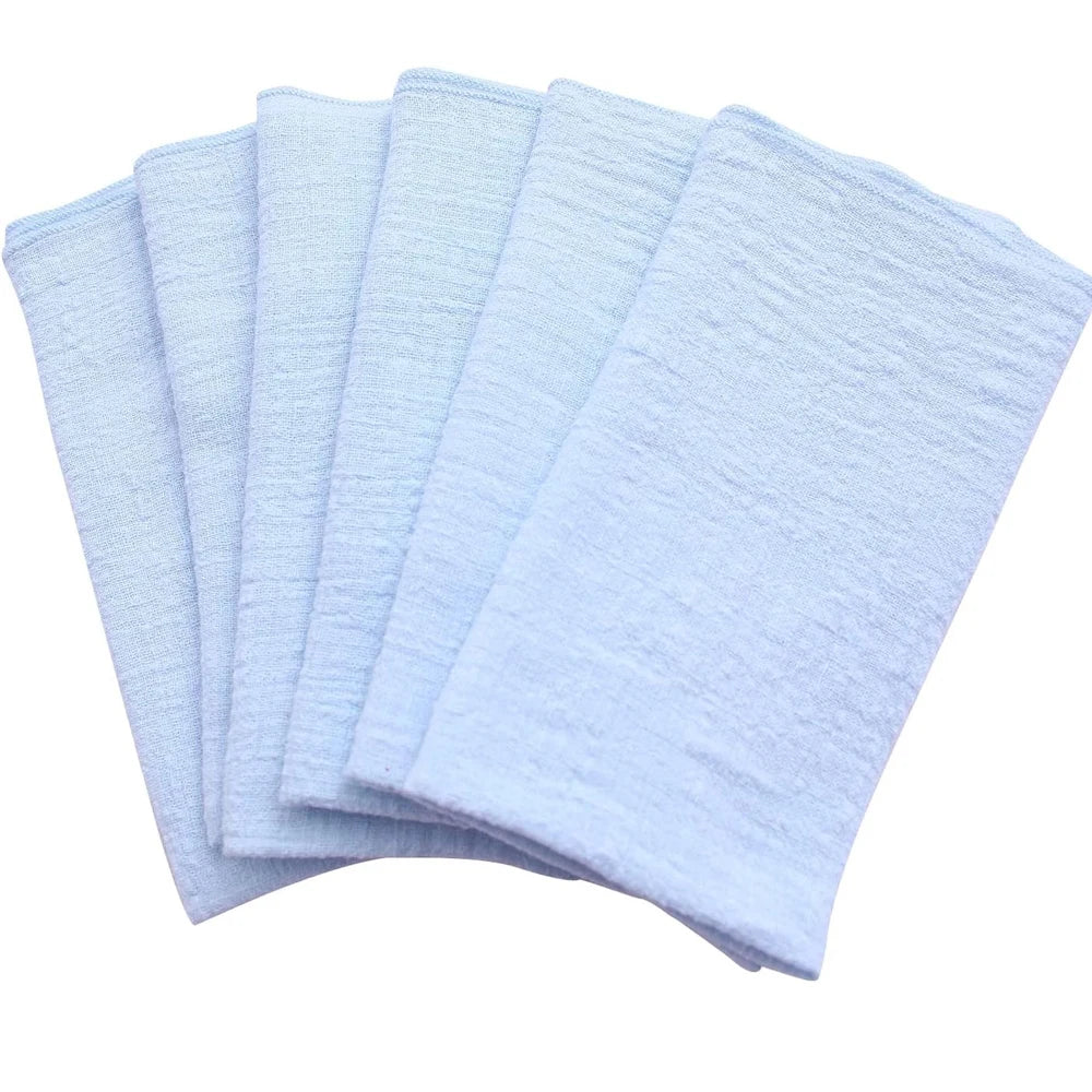 Set of light blue napkins on a white background