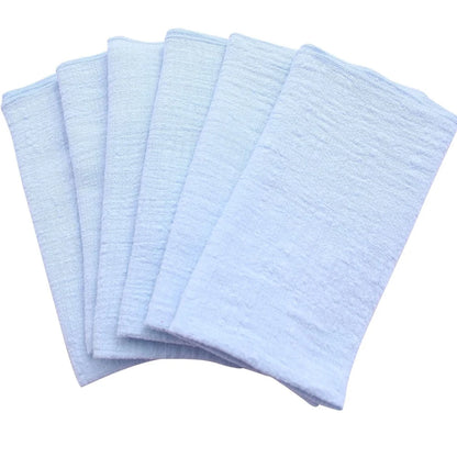 Set of light blue napkins on a white background