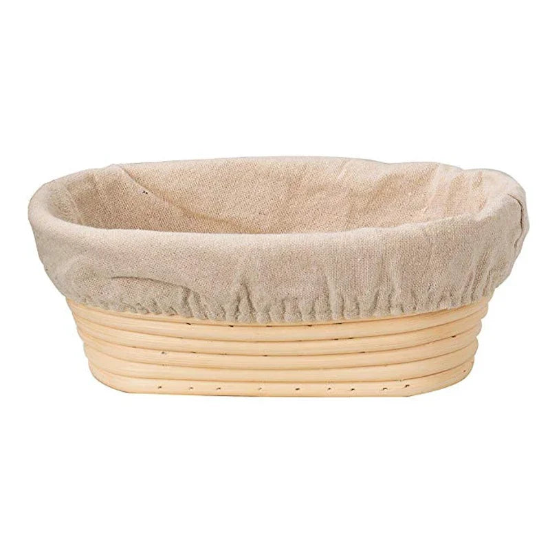 Banneton bread proofing basket with a linen liner on a white background