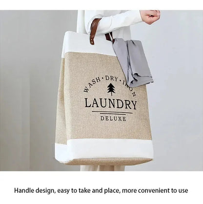 Laundry bag with 'Wash Dry Iron' text held by a person against a plain background