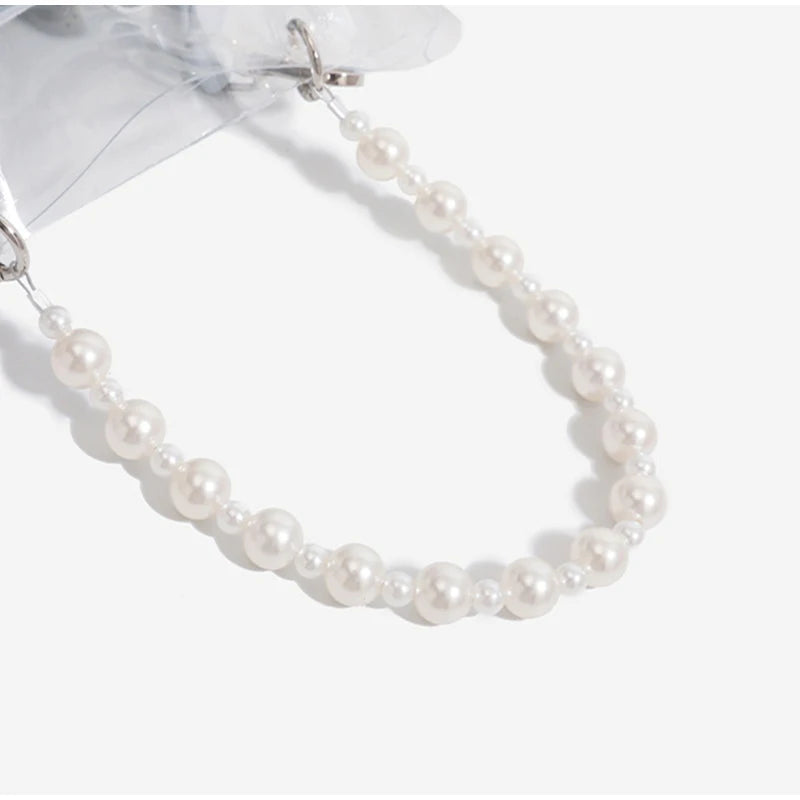 Pearl necklace on a white background