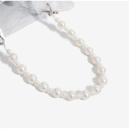 Pearl necklace on a white background