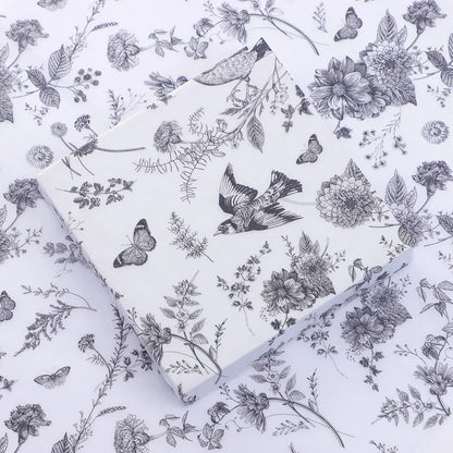 Floral and bird pattern on a white background