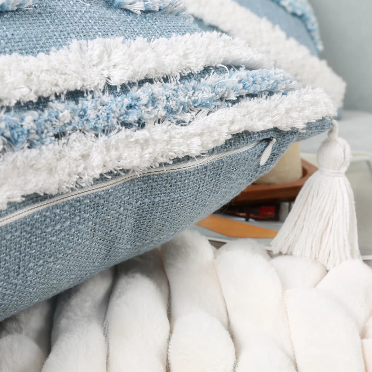 Close-up of a textured blue and white fabric with a blurred background