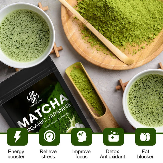 Matcha green tea powder with two cups of matcha, a scoop, and packaging on a gray surface.