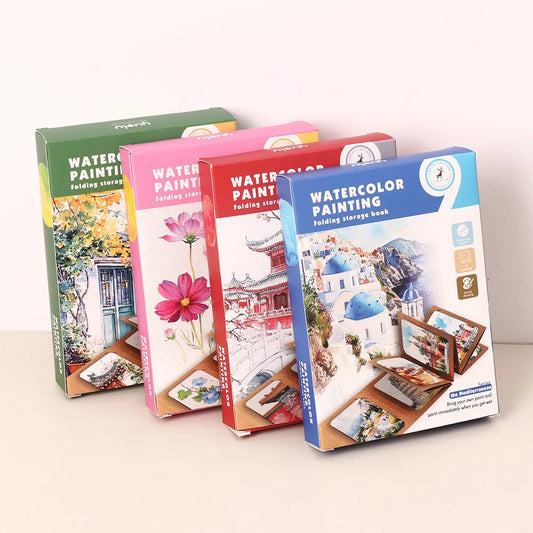 Four watercolor painting books with colorful covers on a white surface