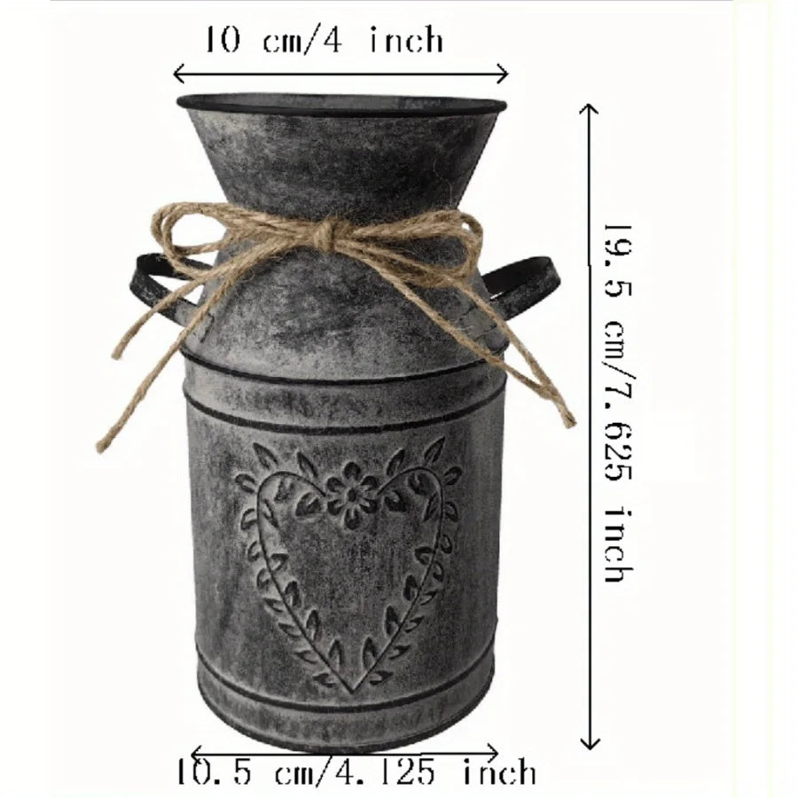 Decorative metal milk churn with jute bow, shown with measurements on a white background