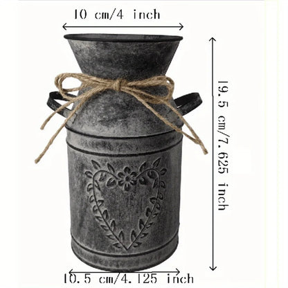 Decorative metal milk churn with jute bow, shown with measurements on a white background