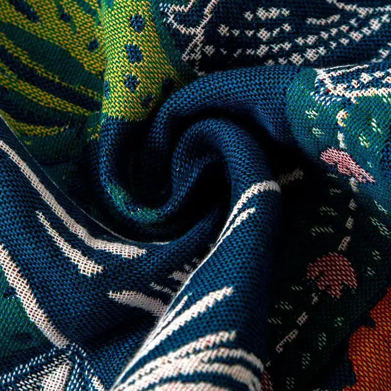 Close-up of patterned fabric with blue, green, and multicolor design