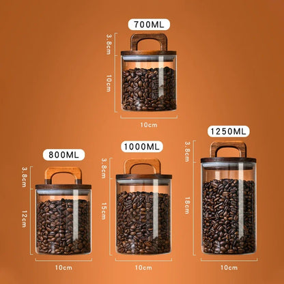 Set of glass jars with wooden handles filled with coffee beans, showing different capacities and dimensions on an orange background.