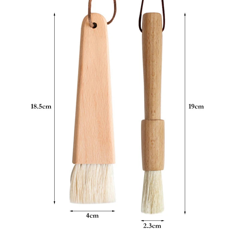Two wooden brushes with measurements on a white background