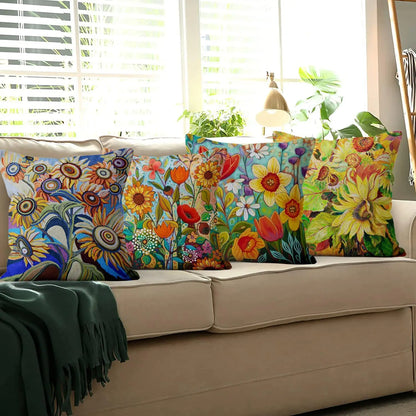 Colorful floral-patterned pillows on a beige sofa with a window in the background