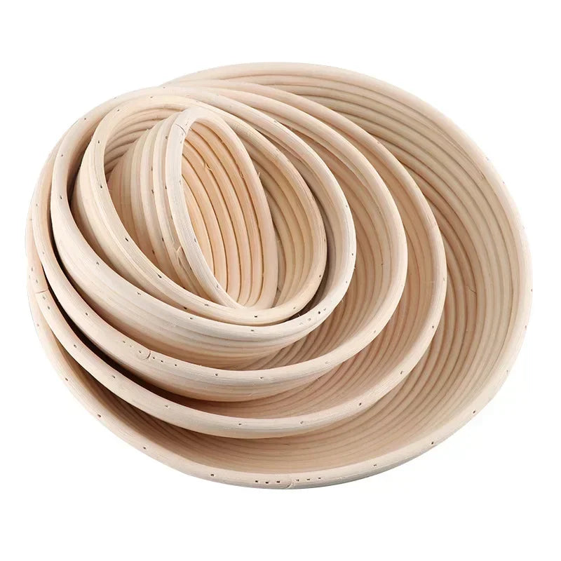 Set of three wooden bread baskets on a white background