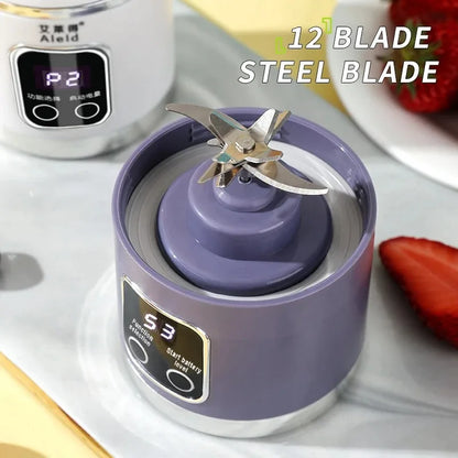 Purple blender with steel blade on a white surface, surrounded by strawberries.