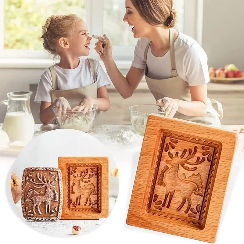 Woman and child in a kitchen with wooden deer-shaped cookie cutters.