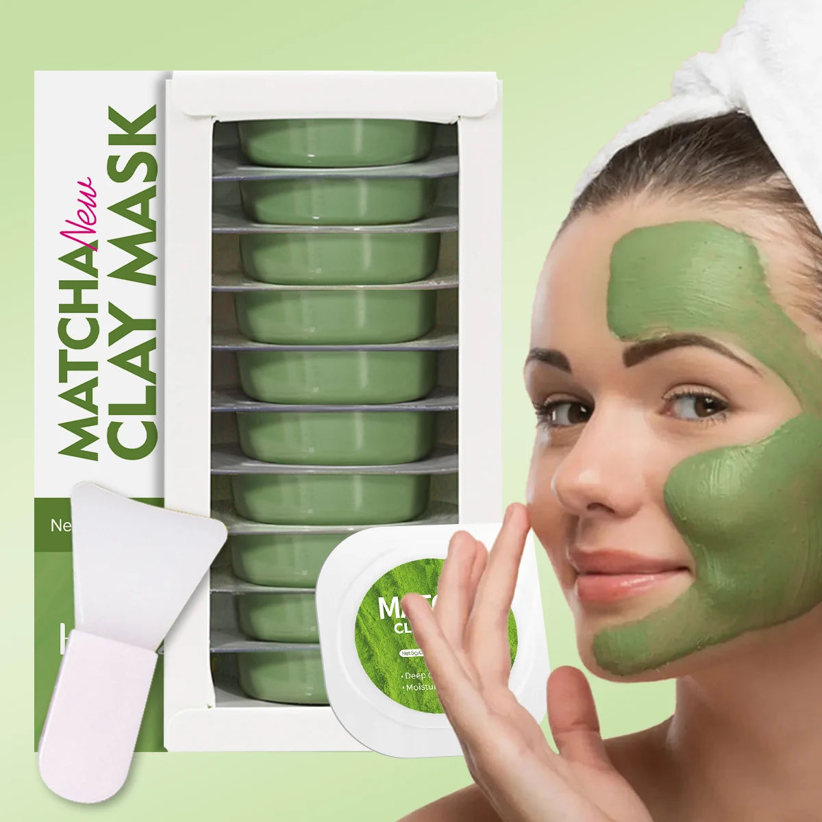 Woman applying matcha clay mask with packaging in the background