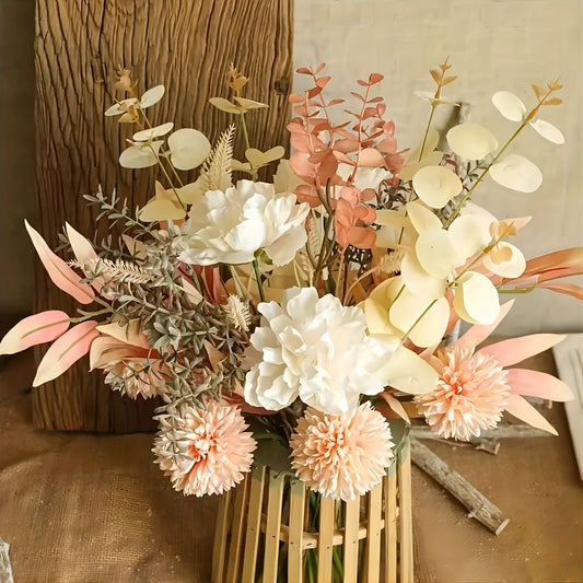 Bouquet of flowers in a vase on a wooden surface