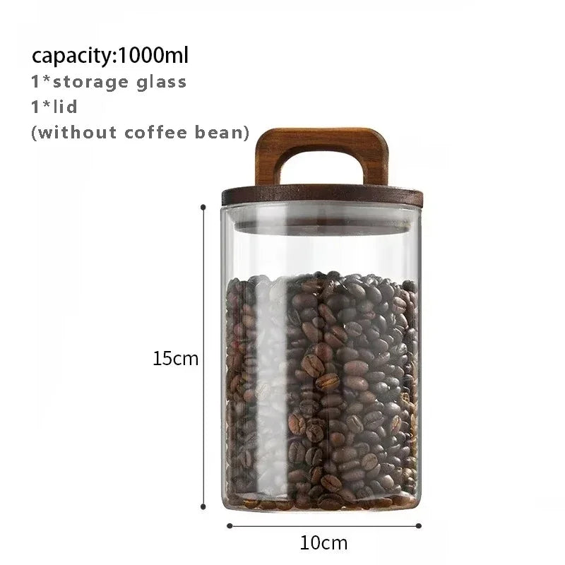 Glass coffee bean storage jar with wooden lid and measurements on a white background
