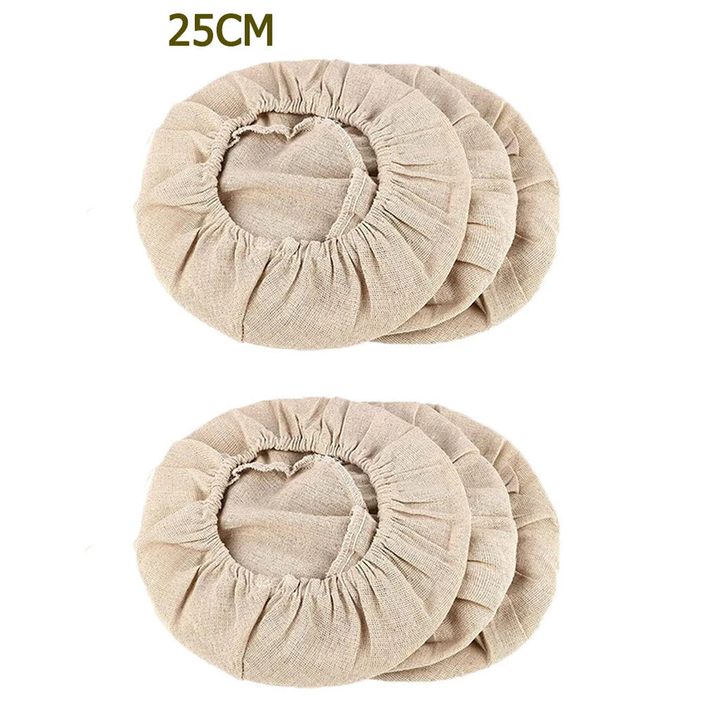 Two beige fabric covers with '10INCH25CM' text on a white background