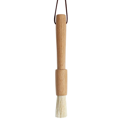 Bamboo brush with bristle head on a white background