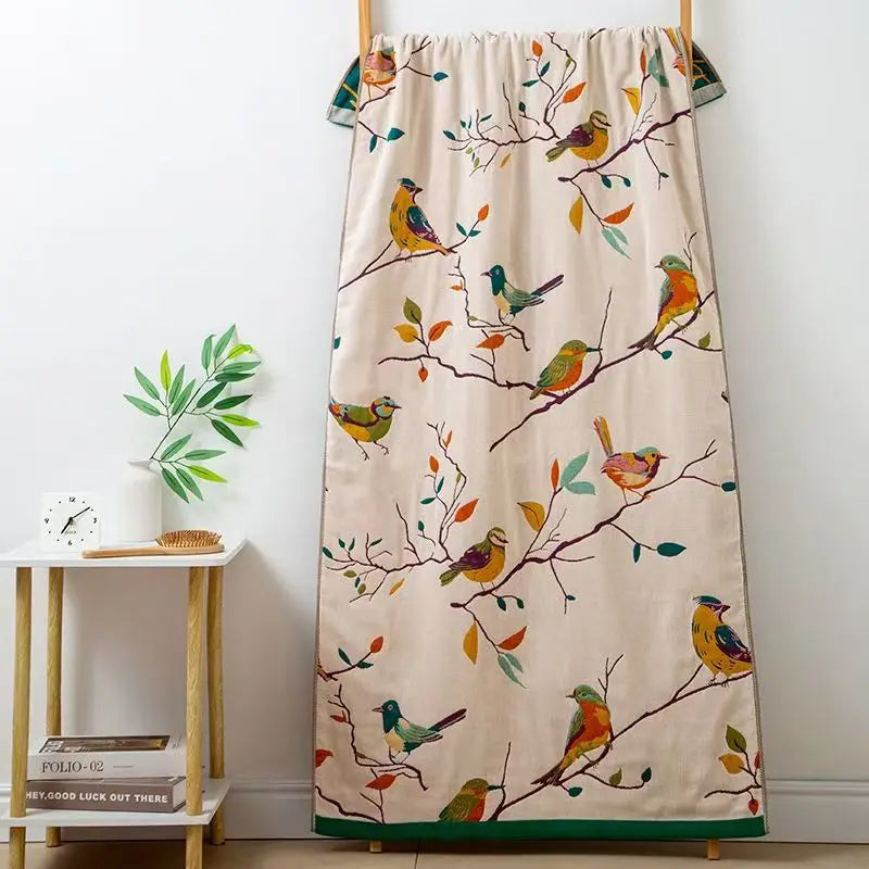 Curtain with bird and branch design on a white background