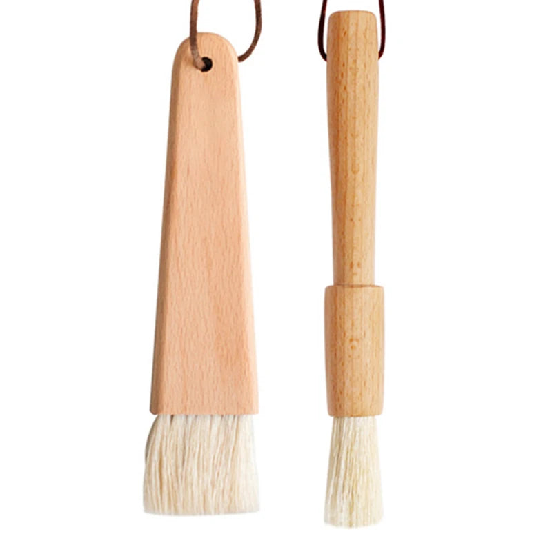 Two wooden brushes with bristle heads on a white background