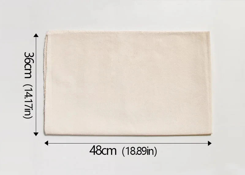 Beige rectangular mat with dimensions labeled on a white background