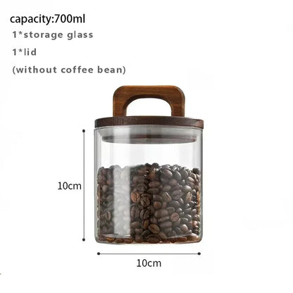 Glass storage jar with wooden lid containing coffee beans, labeled with capacity and dimensions.