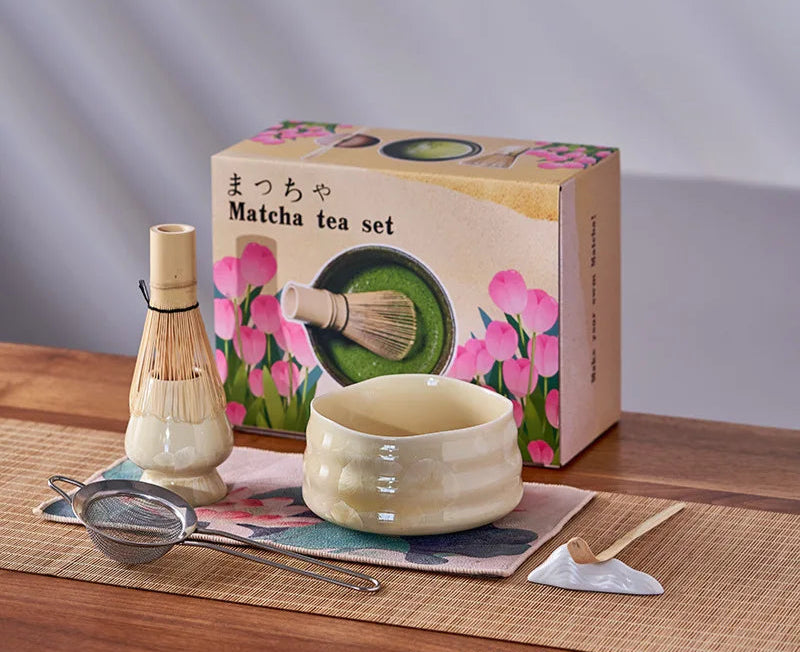 Matcha tea set with a decorative box on a wooden surface