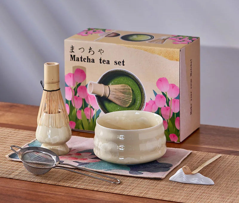 Matcha tea set with a decorative box on a wooden surface